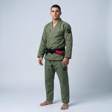 Load image into Gallery viewer, Core Gi Olive – three-quarter front view on model